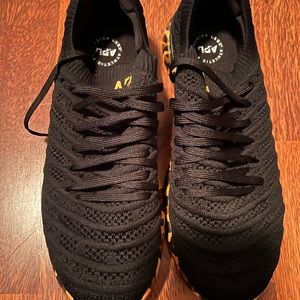 Never worn APL 8.5 black with leopard sole